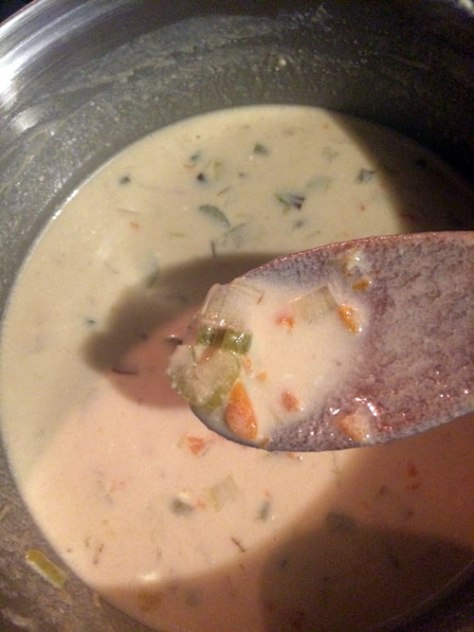 The carrots give the soup a yellowish tinge even before you add the cheddar.